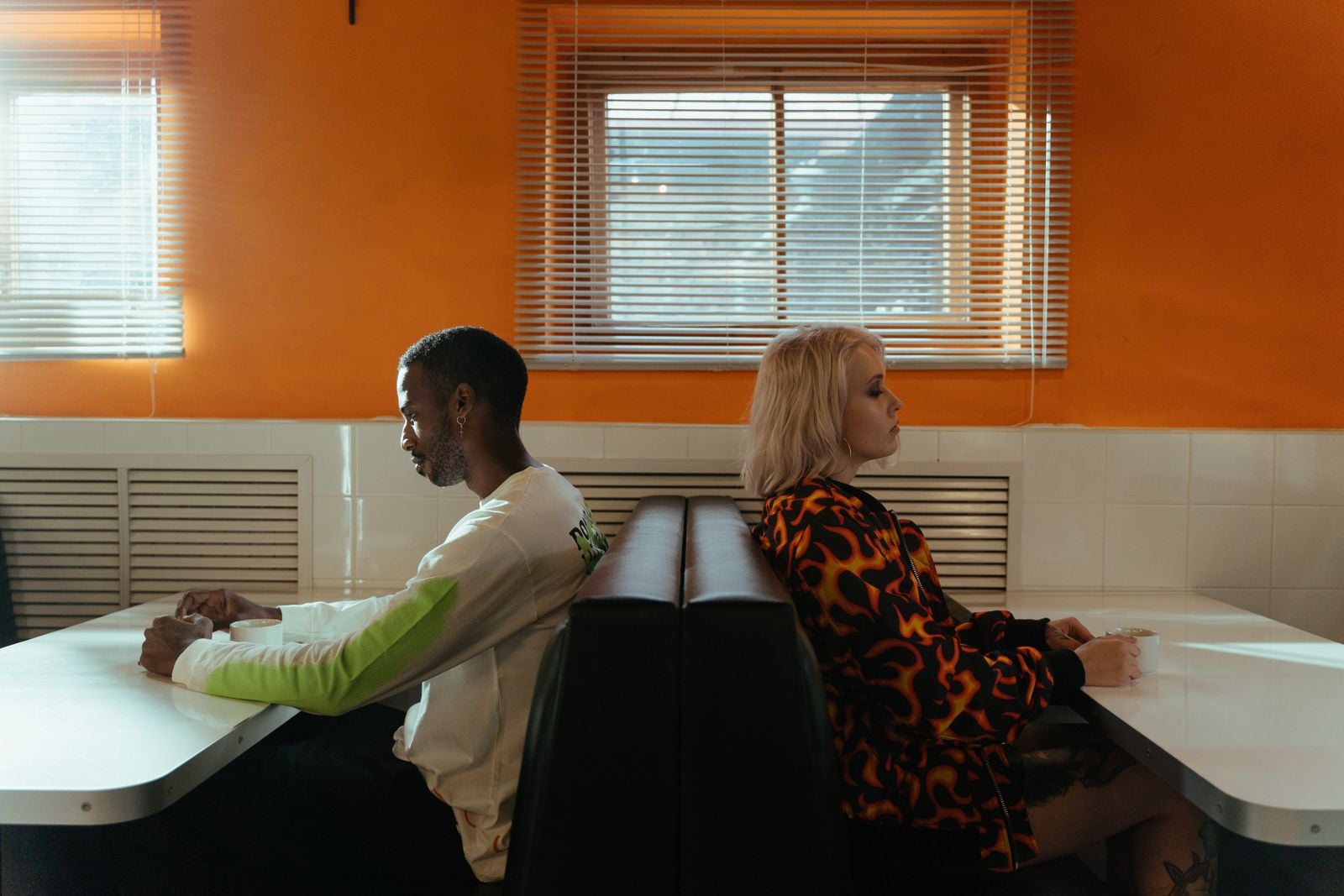 In 1986, John Gottman and Robert Levenson built an apartment-style lab at the University of Washington, wired hundreds of couples to heart-rate monitors during arguments, and found that the moment a partner's pulse crossed 100 beats per minute the conversation effectively ended — and 85 percent of the people who went silent were men