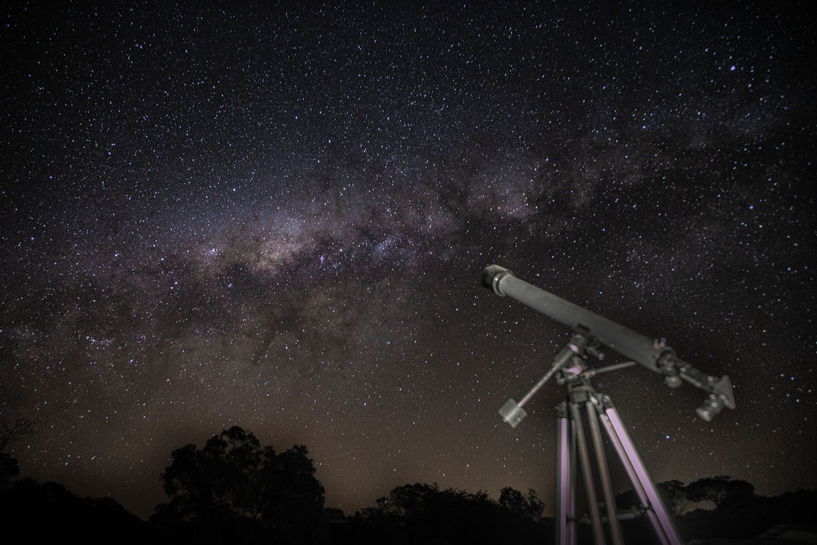 When JWST looked at XLSSC 122, a galaxy cluster 10.4 billion light-years away, it caught gravity bending light from galaxies about 12 billion years in the past, and a dark matter core packed too tightly for cosmic noon