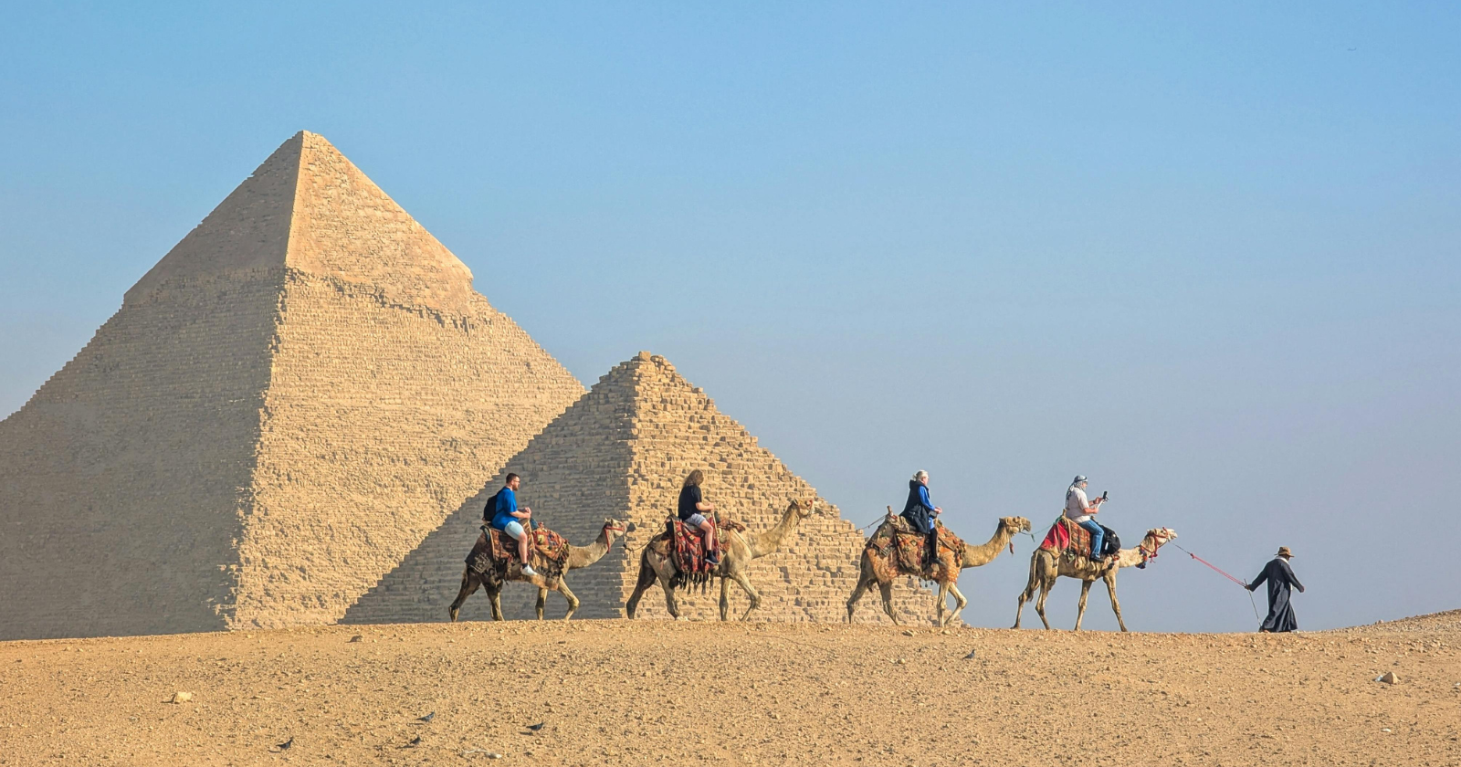 Almost everything the movies taught you about Egypt's pyramids is wrong — not slaves but paid workers, not marooned in empty desert but built beside a river now vanished, not an undocumented mystery but a supply operation we can still read, day by day, in an inspector's own logbook from four and a half thousand years ago