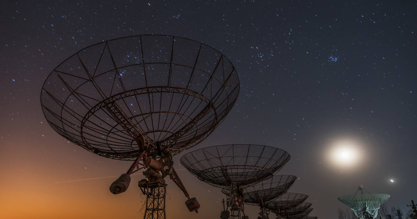 Space lawyers have a name for satellites claimed on paper years before a single one launches: they call them paper satellites, and the earliest filing quietly locks out everyone who comes later