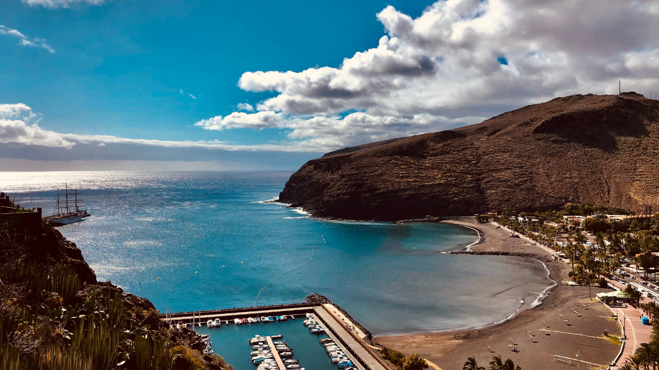 There is a language on a small Spanish island in the Canary archipelago that is made entirely of whistles, can carry a full sentence across six miles of mountain ravine, and is still taught to every child in school