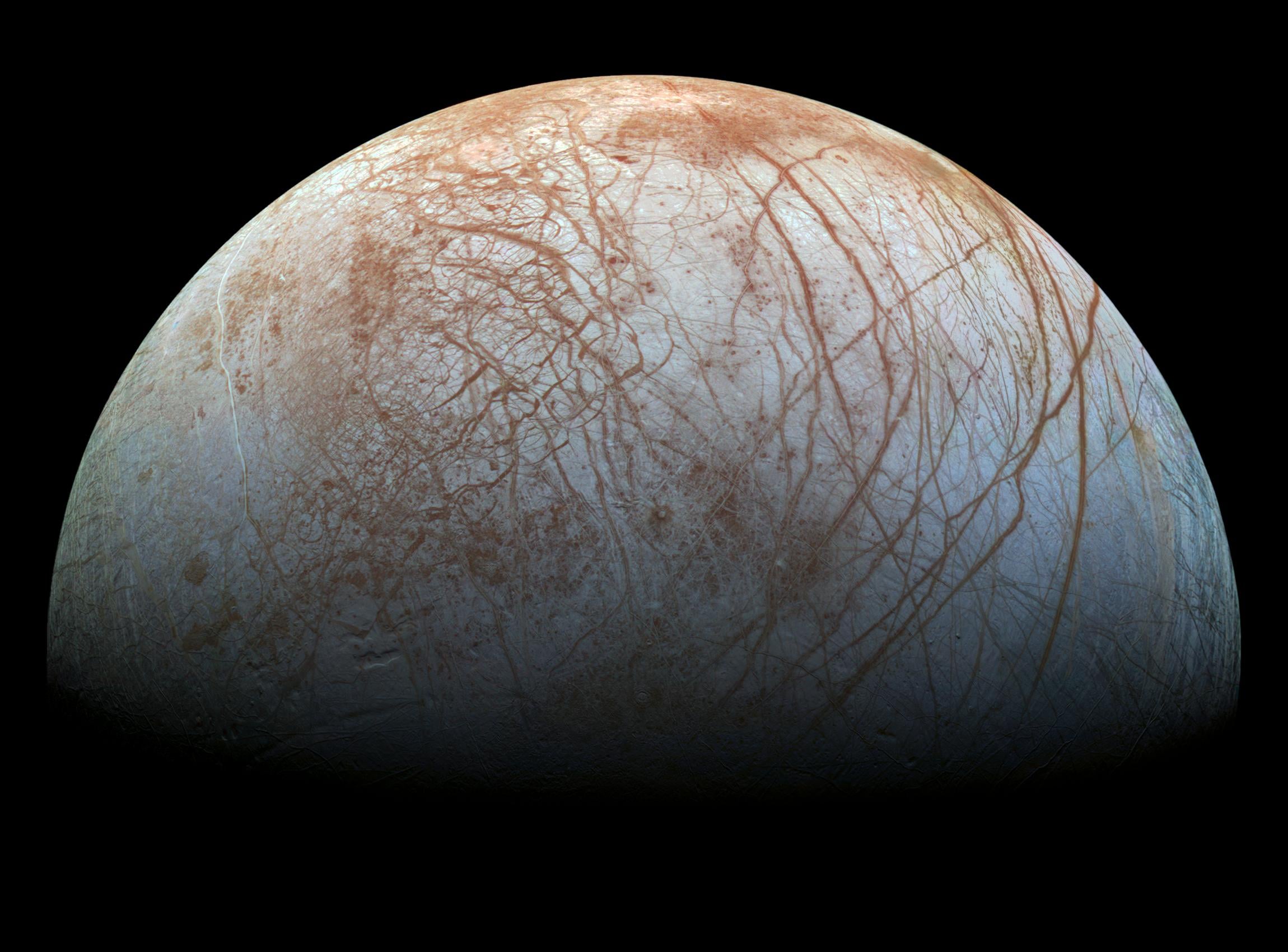 Europa, one of Jupiter’s moons, is sealed beneath a shell of ice, but the ocean hidden below may contain twice as much liquid water as every ocean on Earth combined — and Jupiter’s gravity may have kept it liquid for billions of years
