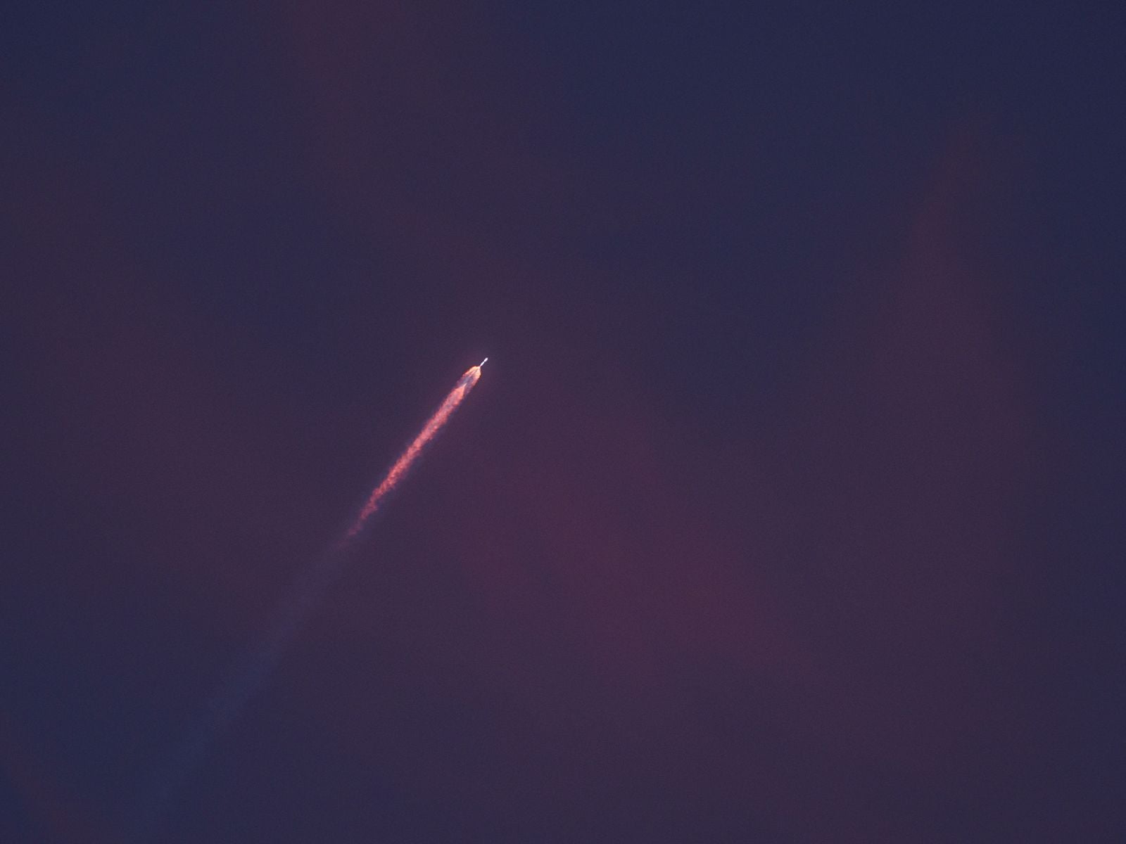 In July 2026, a Falcon 9 carried 21 more satellites into polar orbit for the Pentagon's Golden Dome mesh network, a constellation designed to be too numerous to destroy, yet the laser links meant to weave those satellites into a single battle network are still switched off in orbit, months behind schedule