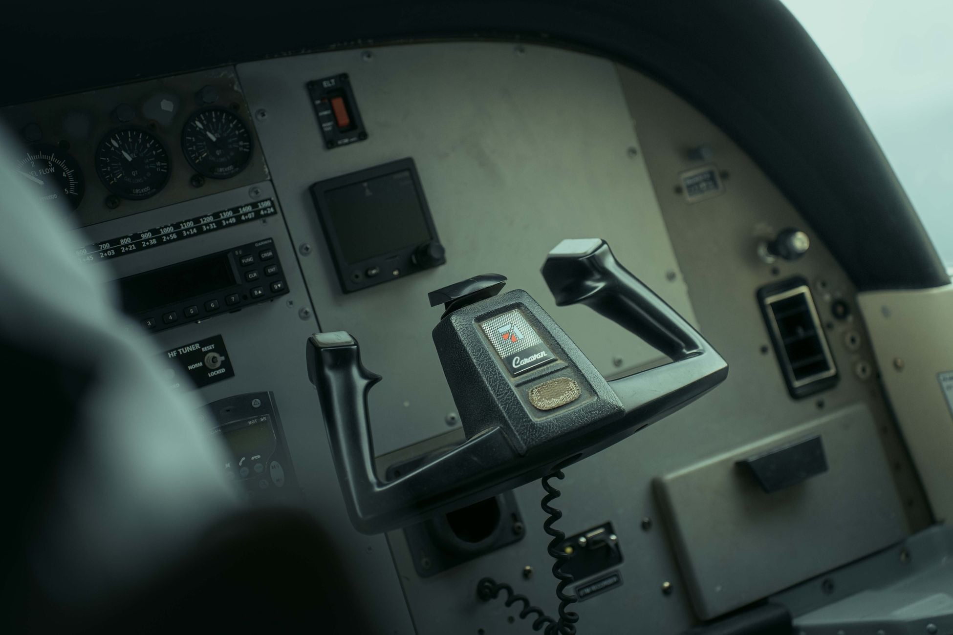 Detail view of a cockpit control panel showcasing instruments and avionics