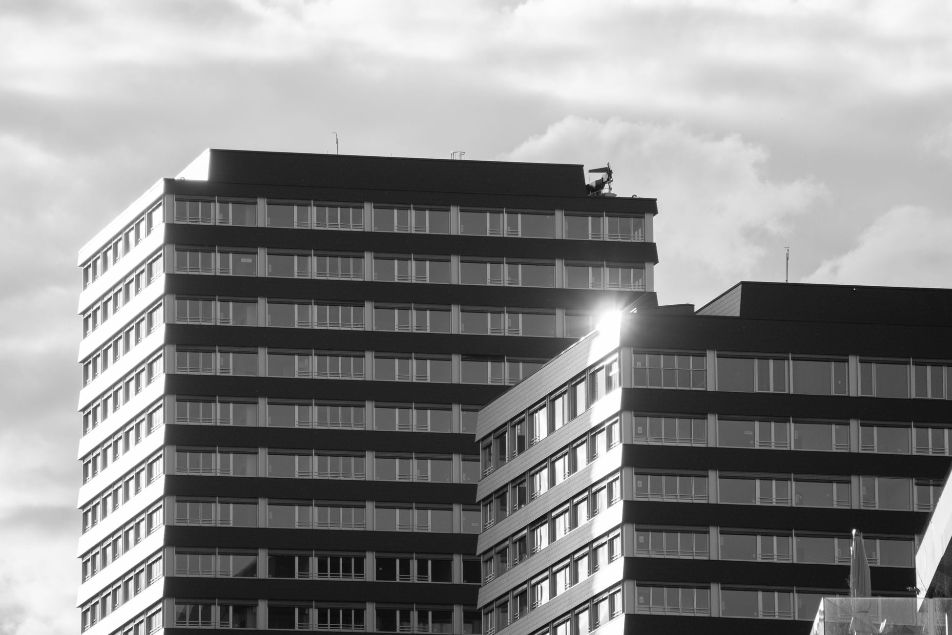 Black and white photo showcasing modern office buildings in Neuhausen am Rheinfall.