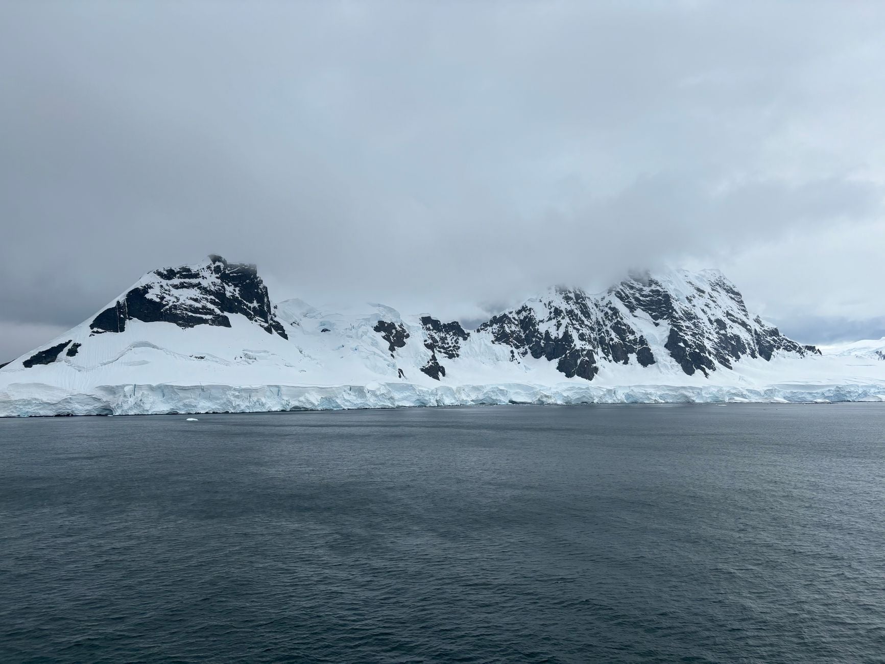 Antarctica is classified as a desert because it receives less precipitation than the Sahara, yet it holds about 70 per cent of the planet's fresh water, locked in an ice sheet averaging over two kilometres thick across the continent