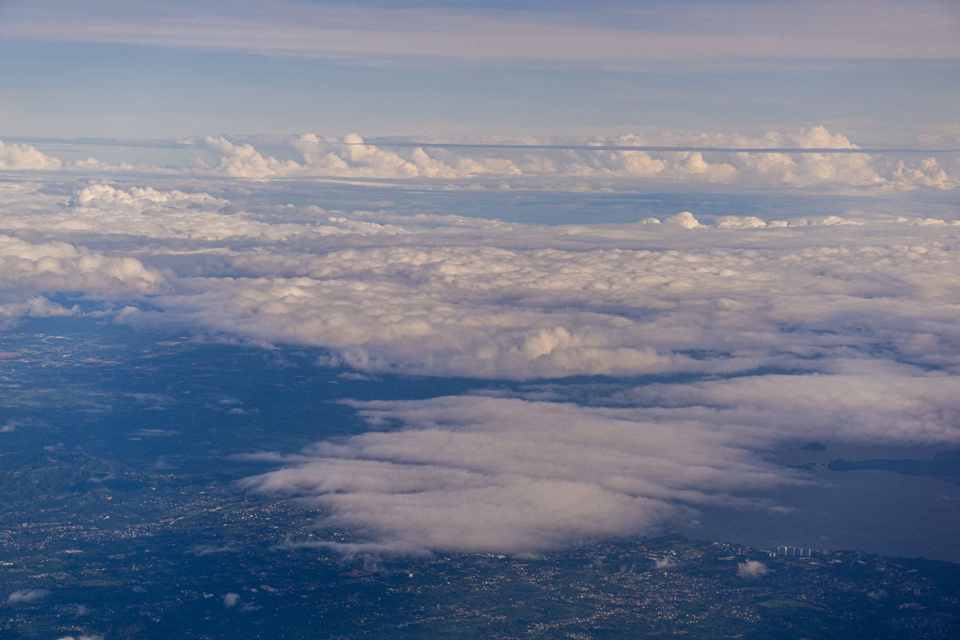 Astronauts who have seen the whole Earth at once describe the overview effect — every war and border and argument hanging in silence — and afterwards traffic and small talk can feel strangely far away