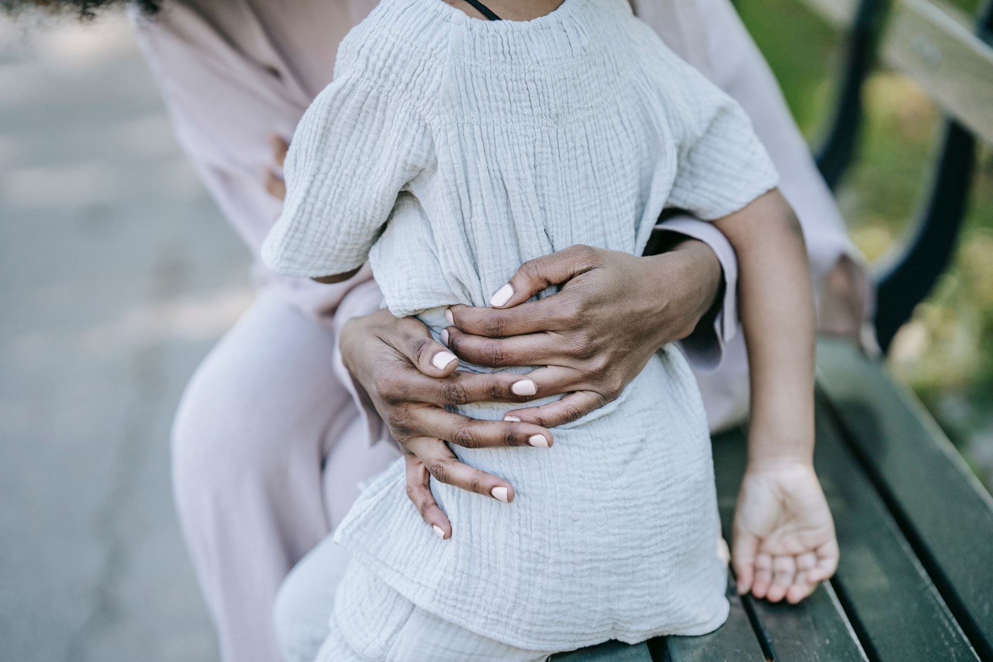 John Bowlby, the British psychiatrist who built attachment theory in the 1950s, argued that a child's need for closeness is as basic as hunger, and that the calm, undemanding child is often the one who learned asking for less kept the peace
