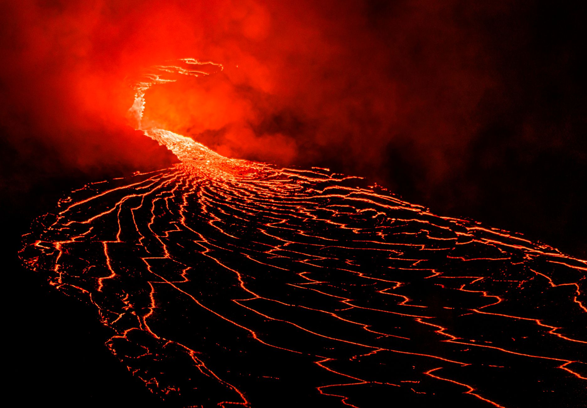 The Earth's inner core grows by roughly a millimetre a year as molten iron freezes onto it, and that slow crystallisation releases the energy that stirs the outer core and keeps the planet's magnetic field alive