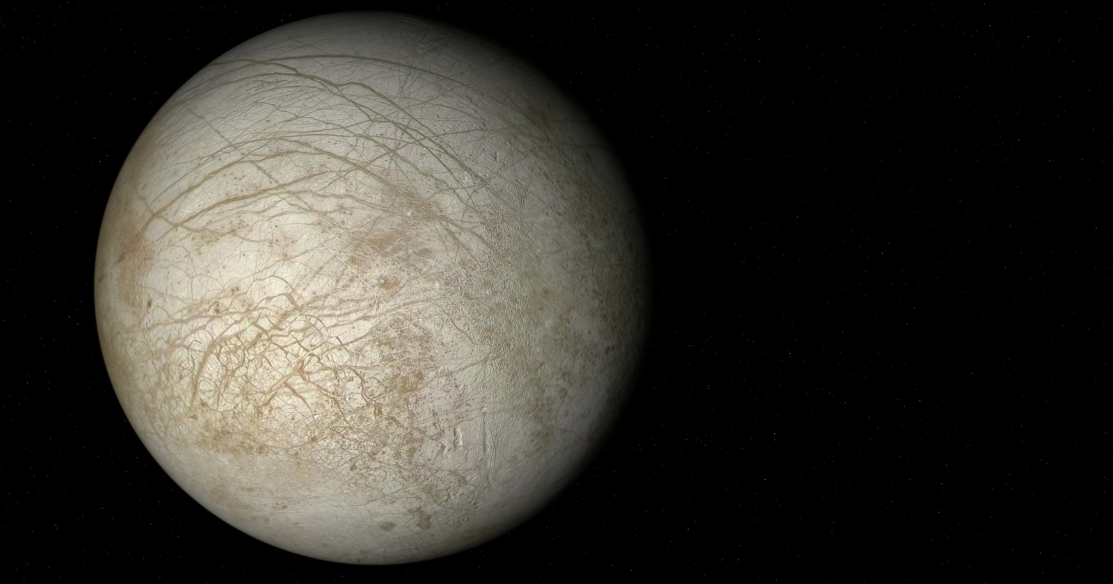 Europa is smaller than Earth's Moon, yet the ocean locked beneath its ice contains more liquid water than every ocean on Earth combined — kept from freezing not by sunlight, but by Jupiter's gravity squeezing the moon like a slow, endless fist