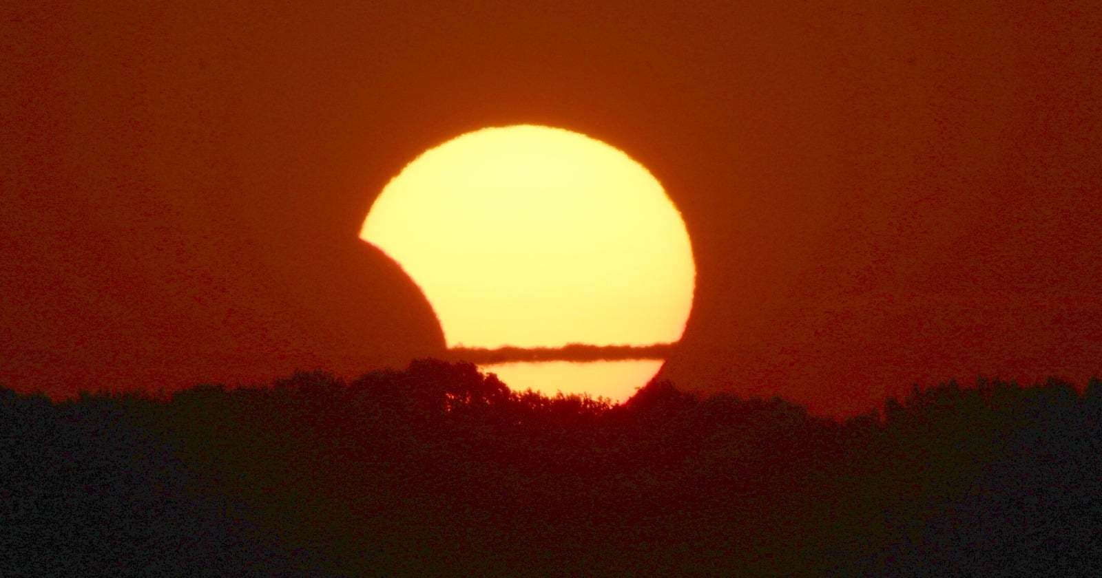 Parts of the northern United States see only a shallow bite taken out of the Sun on August 12, from 3 percent in Detroit to 37 percent in Fairbanks — and the same alignment leaves the sky moonless for that night's Perseid peak