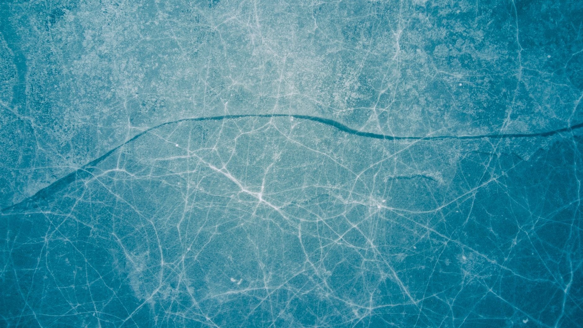 We tend to imagine the habitable zone as a narrow ring around a star, but icy moons have transformed that picture. Far beyond the reach of life-sustaining sunlight, vast oceans may remain liquid beneath their frozen surfaces—warmed by the constant gravitational flexing of the giant planets they orbit.