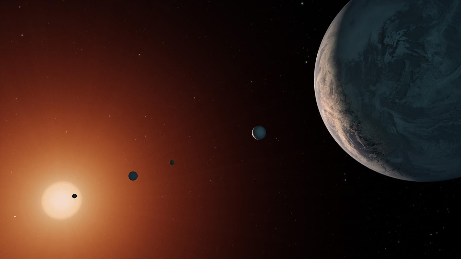 A red dwarf star called TRAPPIST-1, just 40 light-years from Earth, hosts seven Earth-sized planets — including three orbiting in the narrow zone where liquid water could potentially survive