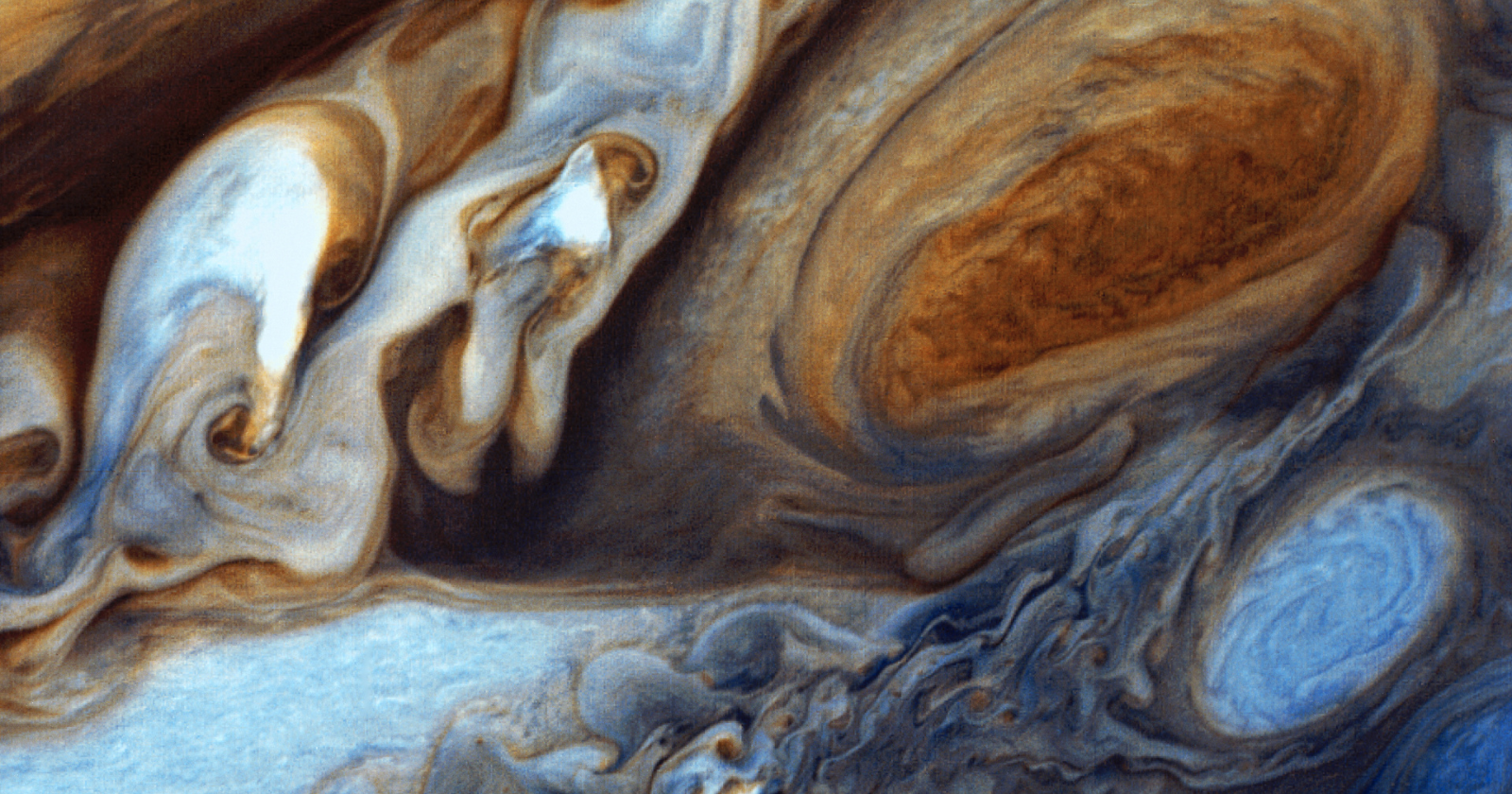 Jupiter has no ground to stand on at all — descend far enough into its atmosphere and there's no solid surface waiting, only thickening gas that eventually behaves like liquid metal, a world where the very idea of "landing" stops making sense