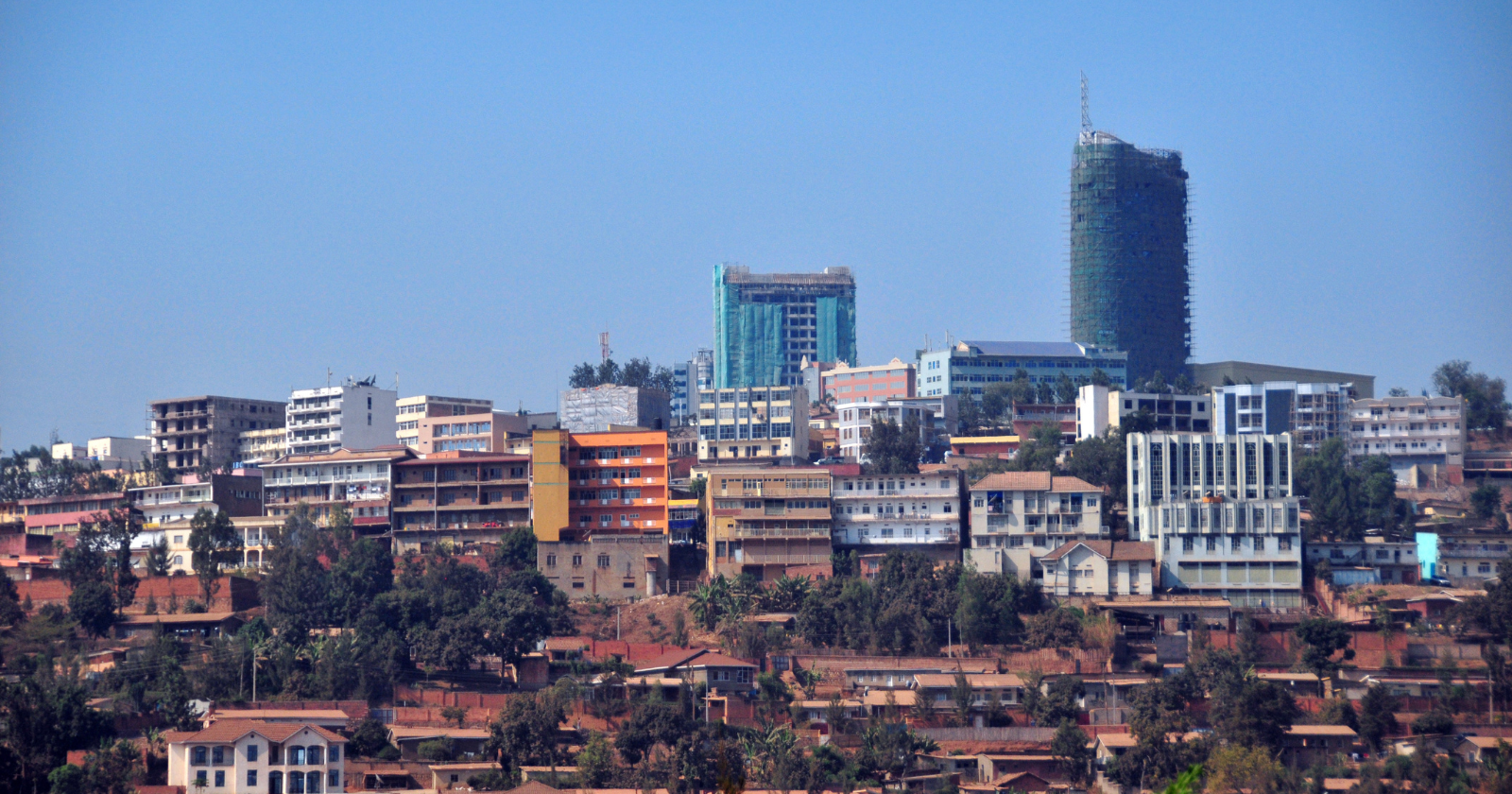 More than three decades after the genocide, Rwanda has the highest share of women in a lower or single chamber of parliament of any country, and it is not close — 51 of 80 seats, 63.75%, against a global average of about 27%. The constitutional floor is 30%; women hold nearly half of the directly elected seats too