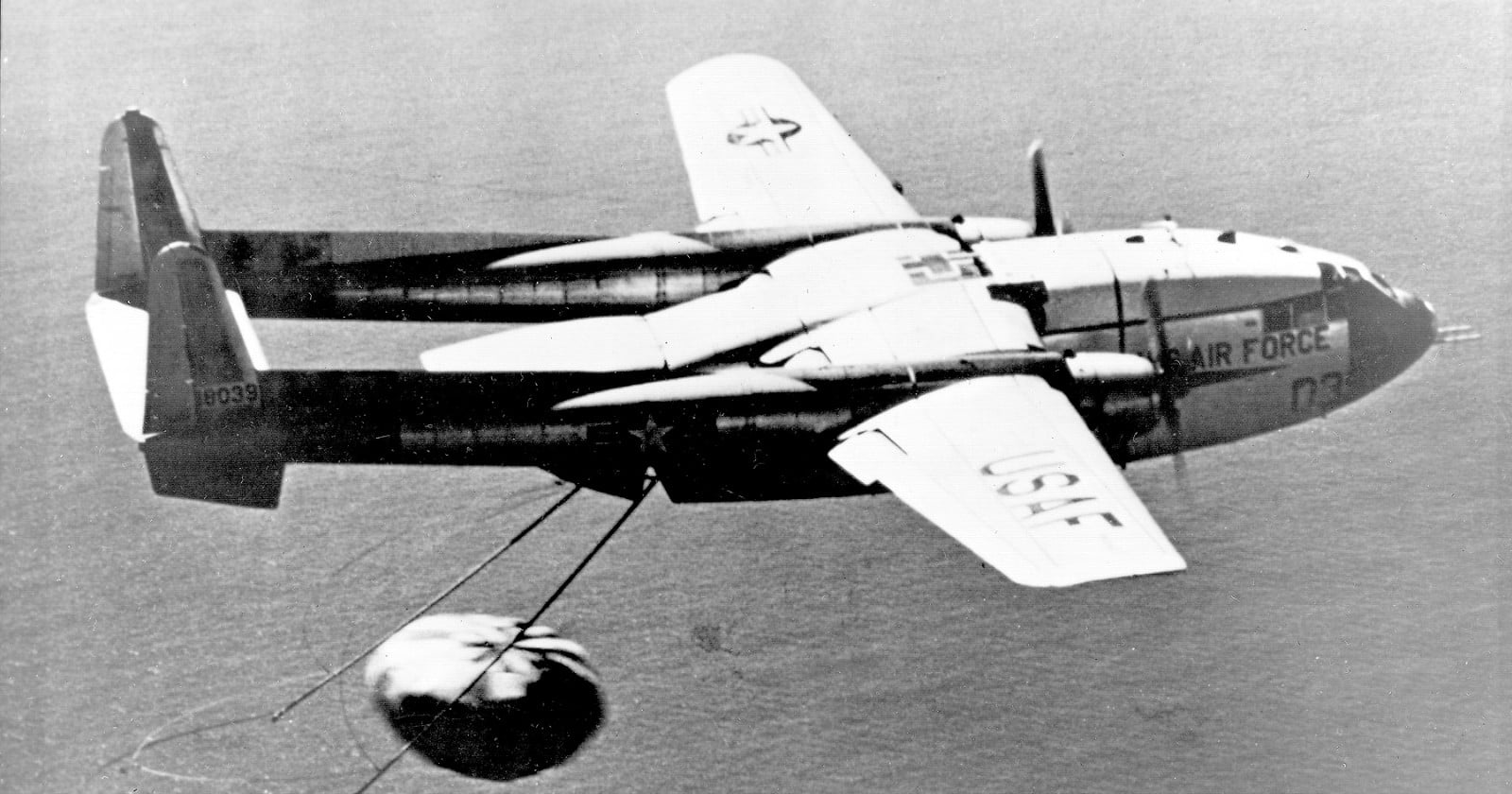 The first man-made object recovered from orbit came down in the Pacific instead of being caught in mid-air, and by the time the capsule reached Honolulu the Navy had painted "Compliments of the US Navy" on the shipping can