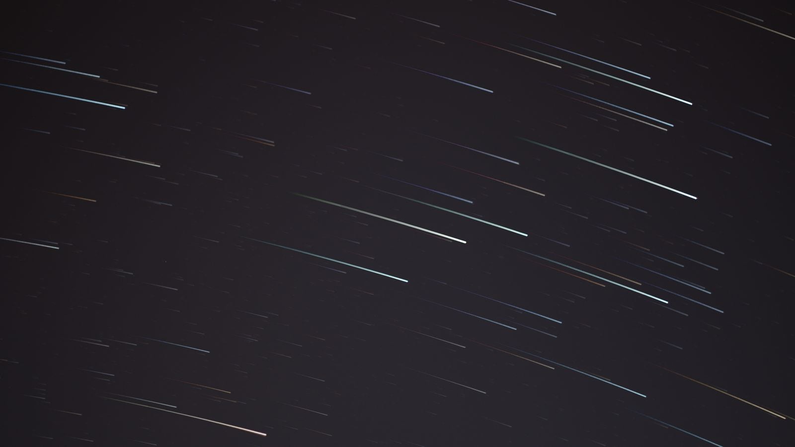 Travelling at the speed of light is not just hard but impossible for anything that has mass, since it would take infinite energy, so the real question is how close we could get and whether the loopholes physicists talk about are more than mathematics