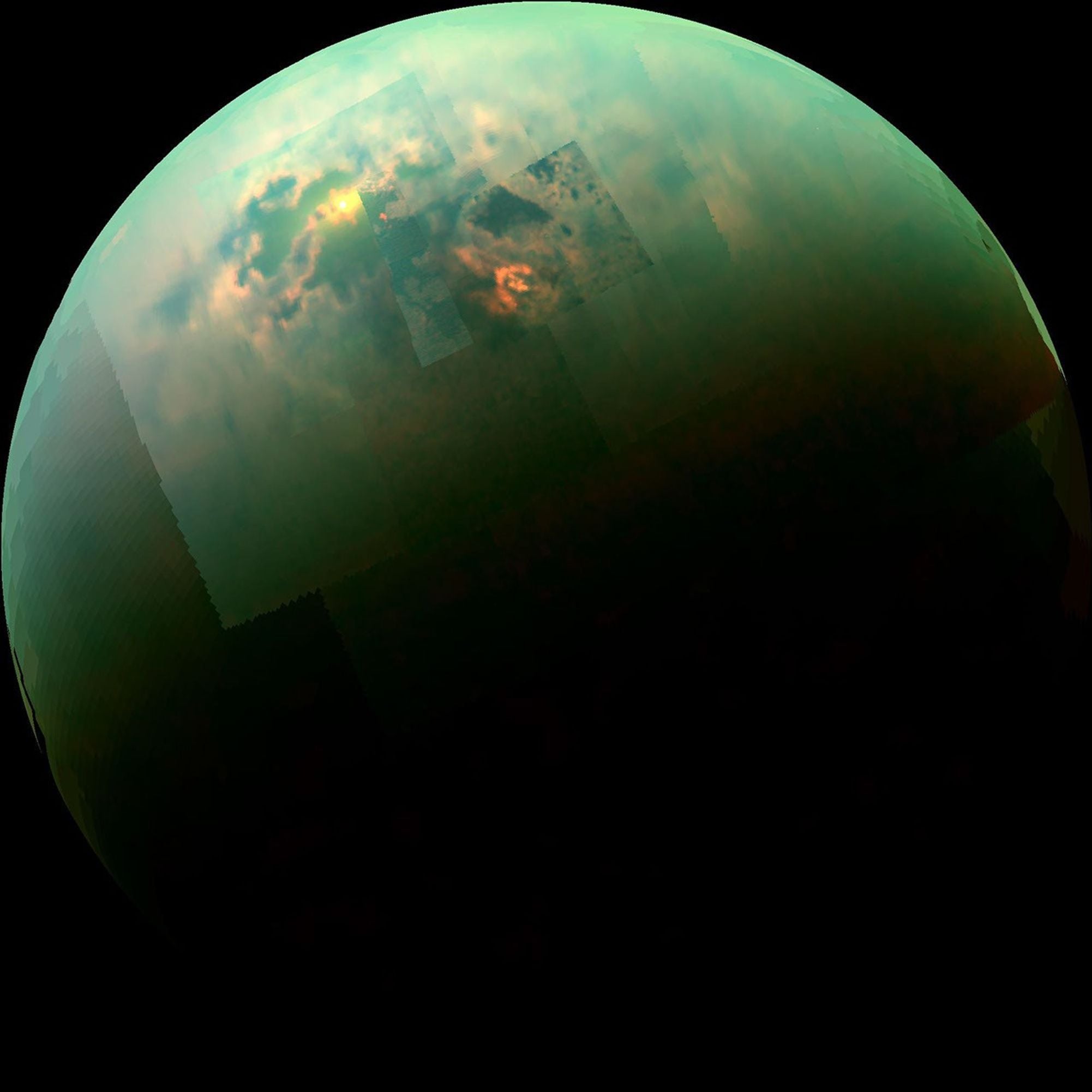 Titan is wider than Mercury, operates a complete methane weather cycle, and contains hundreds of times more liquid hydrocarbons than all Earth’s known oil and gas reserves. It is the only known world beyond Earth where you could stand beneath clouds beside a calm lake—provided you remained sealed inside a heated, oxygenated suit.