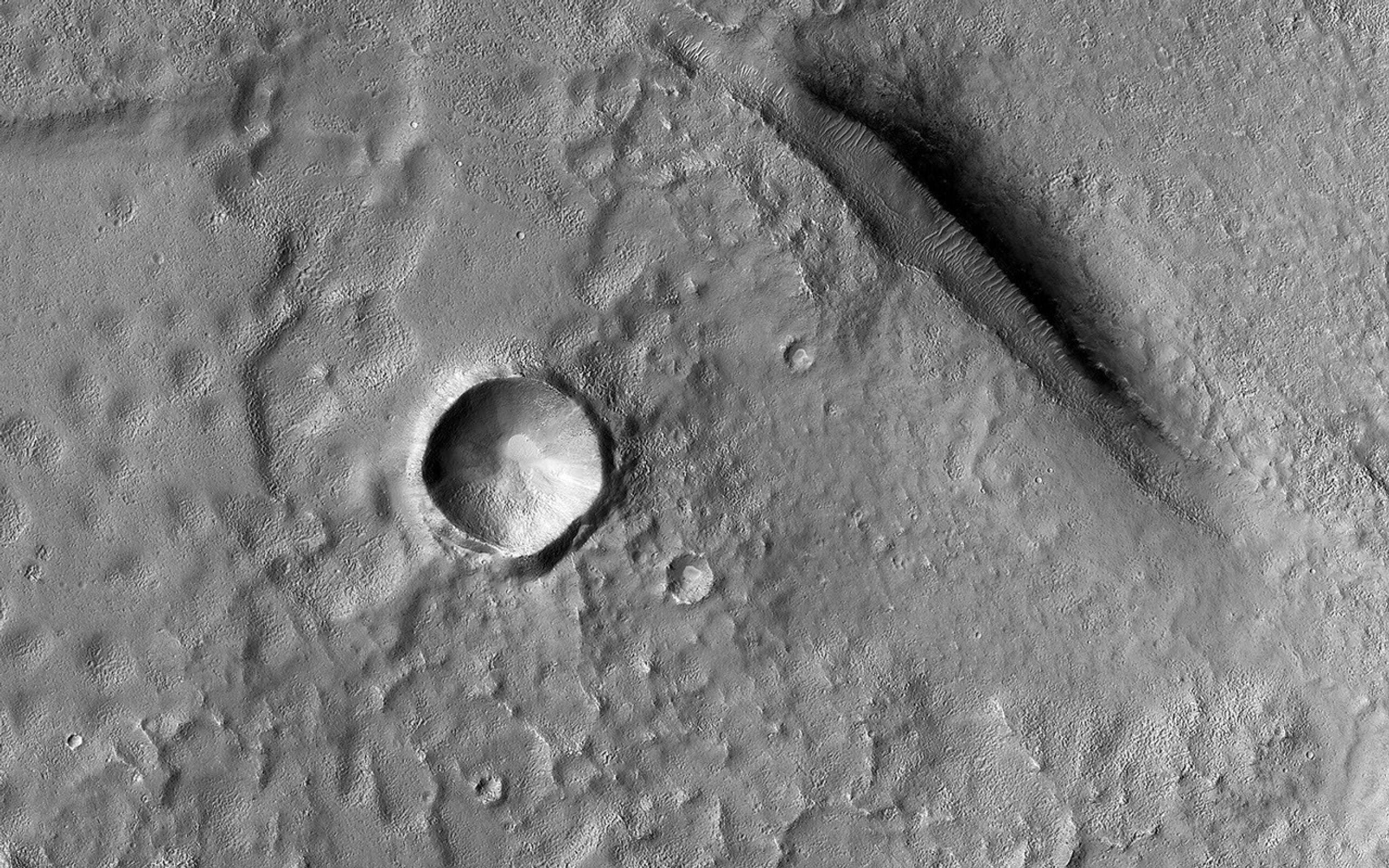 Gypsum crystals discovered by Zhurong on roughly 760-million-year-old Martian terrain may still contain microscopic pockets of the brine they grew from — tiny sealed samples that could preserve the chemistry of liquid water from a surprisingly recent chapter of Mars’s history.