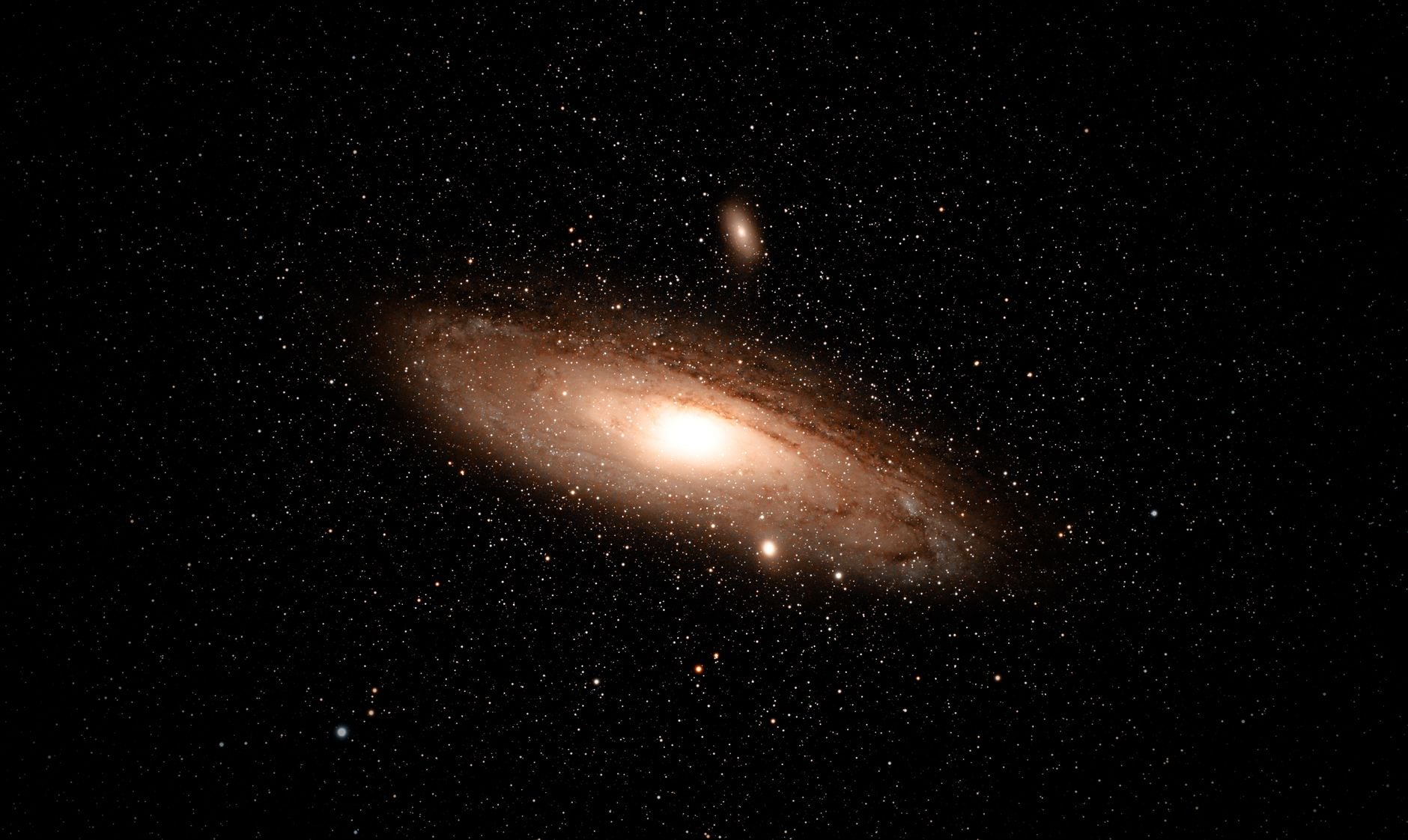 The faint smudge of Andromeda you can see with your naked eye on a dark night is 2.5-million-year-old light — photons that left another galaxy around the time the earliest members of our genus were walking Earth.