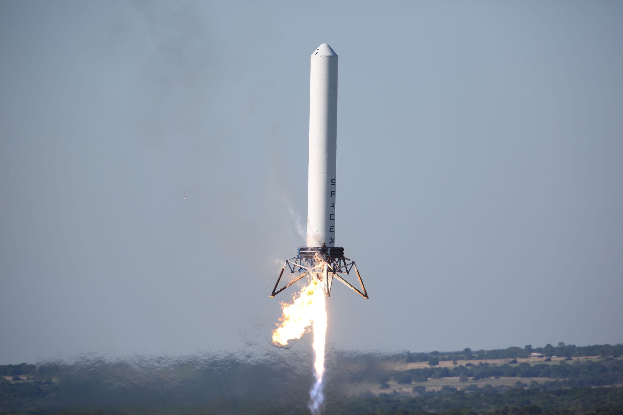 Sending a kilogram to orbit cost roughly $55,000 in the Space Shuttle era. Reusable rockets have brought the theoretical cost down to a few thousand dollars today. If Starship eventually achieves rapid full reusability, some projections put the figure below $100/kg — potentially turning access to orbit from an extraordinary expense into something approaching ordinary transportation.