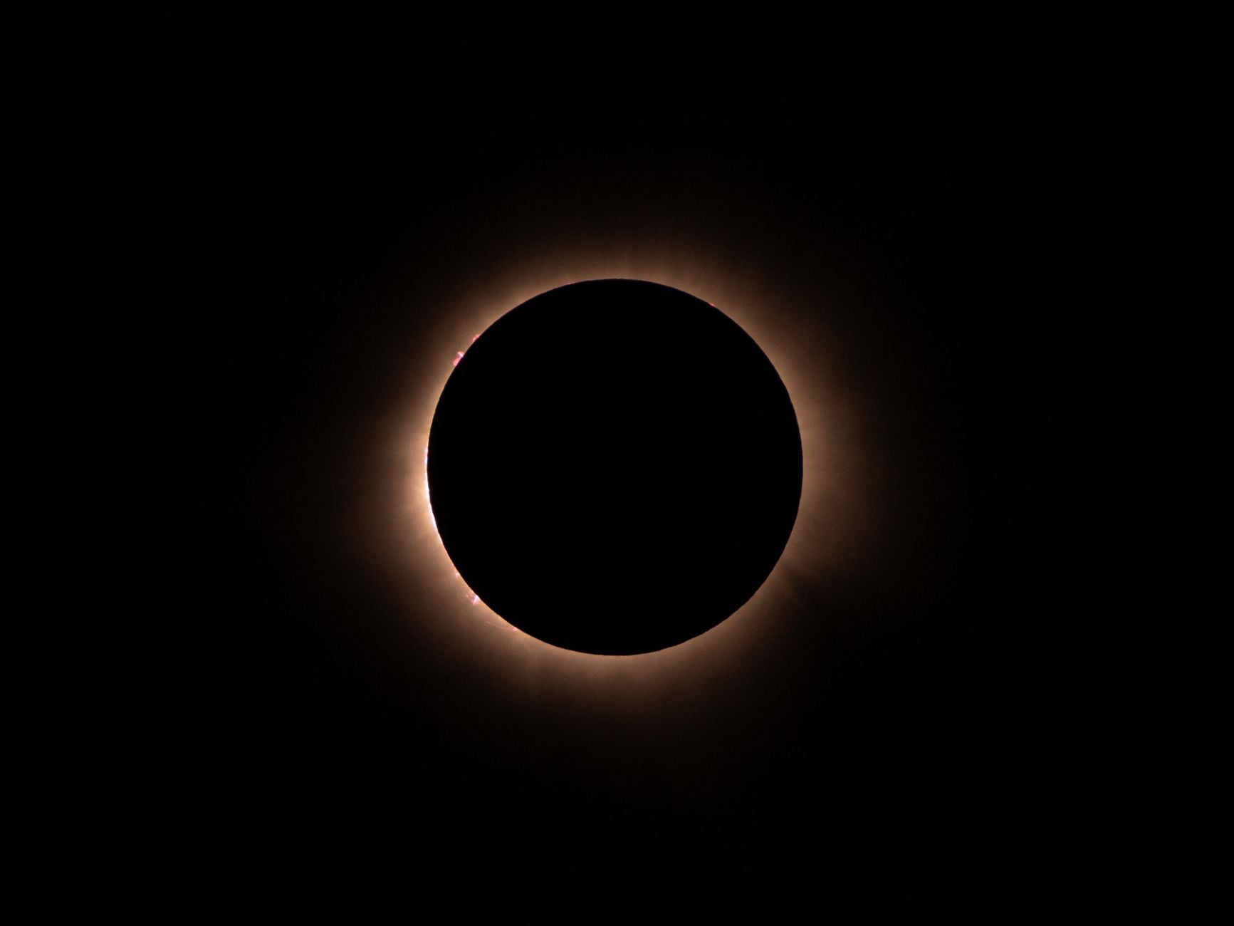 The Sun's corona — the faint halo visible only during a total solar eclipse — routinely reaches temperatures of 1 to 2 million degrees Celsius, while the visible surface just below it sits at around 5,500 degrees, a paradox that has puzzled astrophysicists since 1939