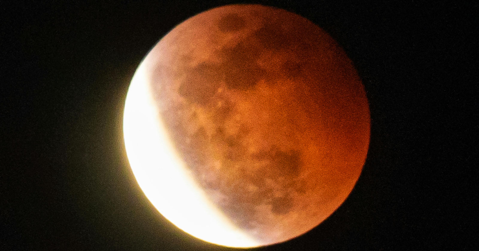 Ninety-six percent of the Moon slides into Earth's shadow on Thursday night and it still doesn't count as a total eclipse, because a sliver of the northern edge stays in sunlight and burns white against a copper disc for more than an hour
