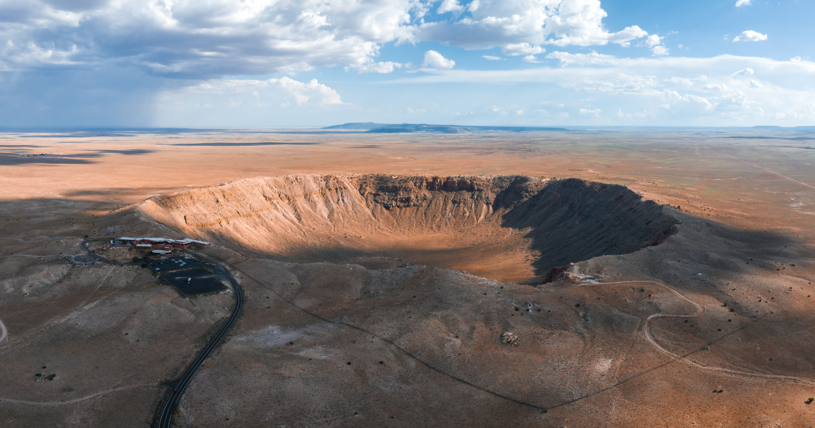 In 1903, a mining engineer staked a claim on Arizona's Meteor Crater, convinced a fortune in iron lay beneath the floor, and spent 26 years drilling for a meteorite that had mostly vaporized on impact — his family still owns the crater today, and science later proved him right about everything except the treasure