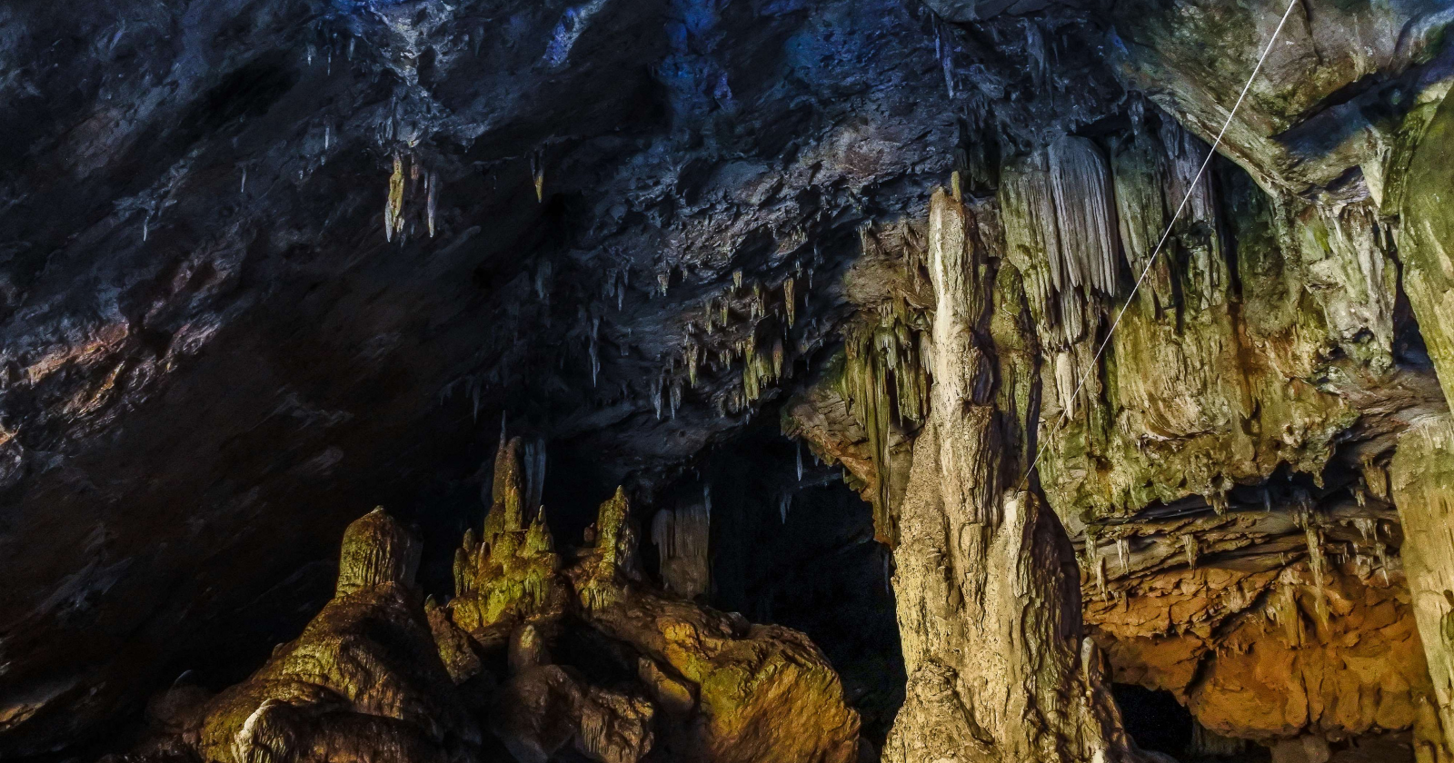 About 176,000 years ago, Neanderthals built enormous rings from broken stone formations 336 meters inside a French cave — more than two tonnes of material arranged in total darkness for a purpose archaeologists still cannot explain