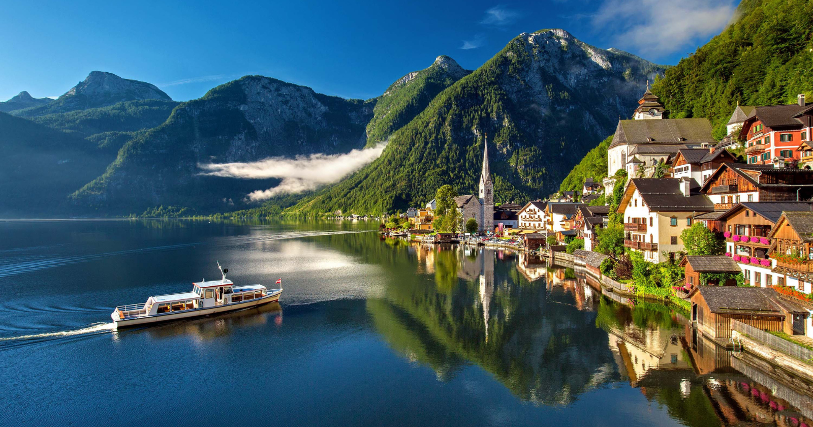 A Chinese developer copied an Austrian lakeside village street by street, church tower included, and opened the replica in Guangdong in 2012. The original's 800 residents now handle around a million visitors a year, many arriving to see the thing that was copied