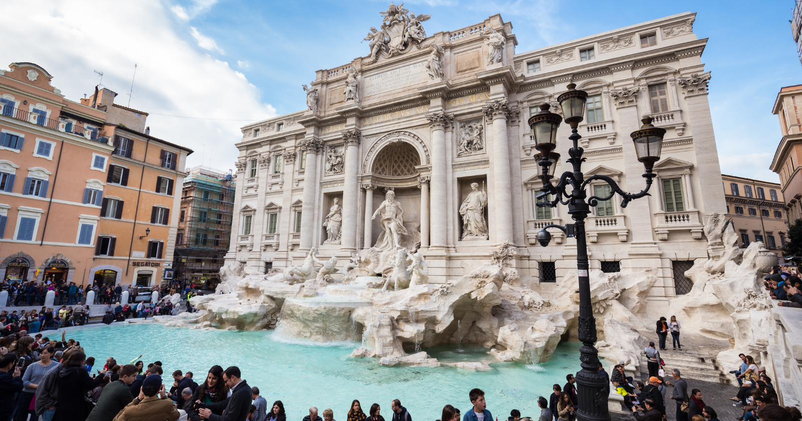 Rome pulls around €1.5 million in coins from the Trevi Fountain every year and gives it to a Catholic charity — workers sweep the coins into long piles and vacuum them through suction hoses as new wishes keep landing in the water