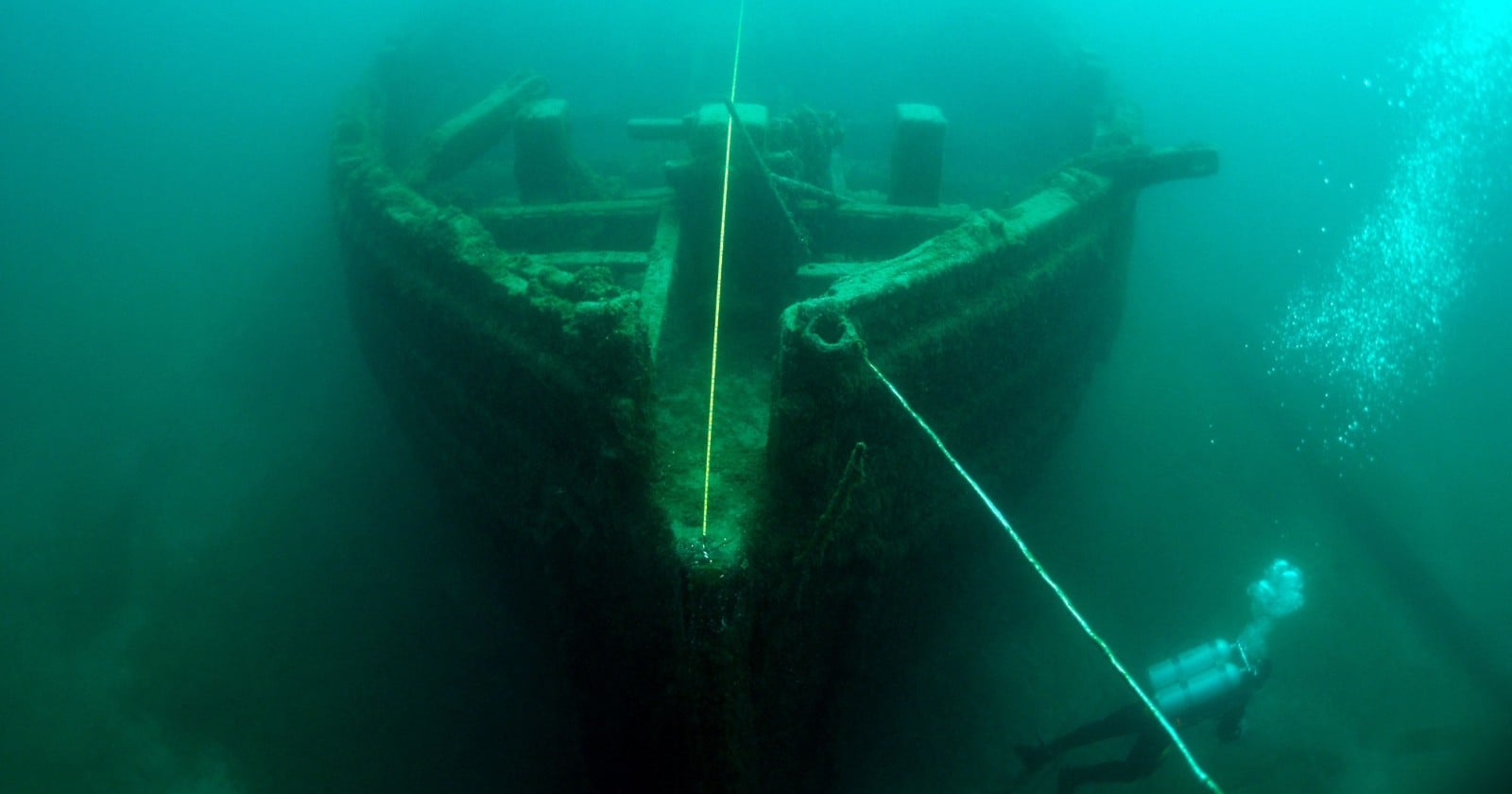 A father and his 6-year-old daughter came across wreckage while fishing off a Wisconsin island, and state archaeologists say the timbers are likely a lumber schooner that ran onto the shoal in October 1871 in smoke so thick the island's lighthouse keeper had kept his light burning through the day