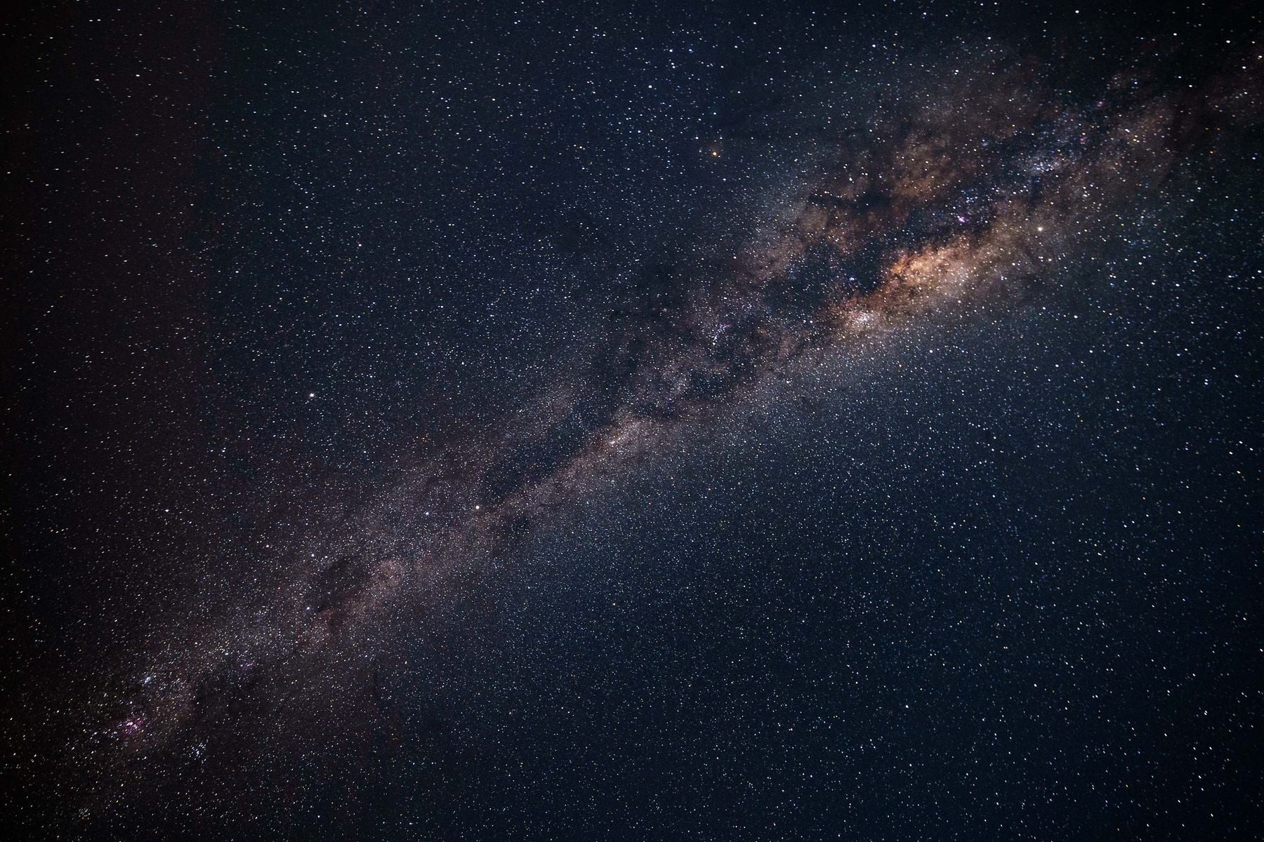 Photo: Spacedaily The Milky Way crossing a dark, star-filled night sky