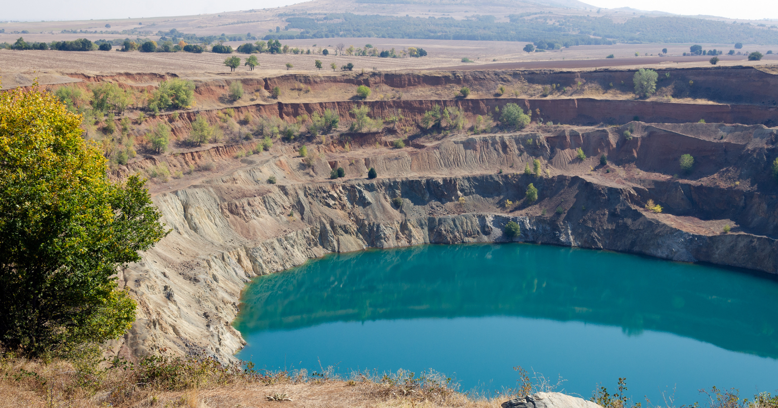 Australia's largest gold mine closed in 2001 and left two open pits in far north Queensland, and engineers have now filled them with water and joined them through an underground powerhouse, so the holes the miners dug work as a 250-megawatt battery that starts in under 30 seconds