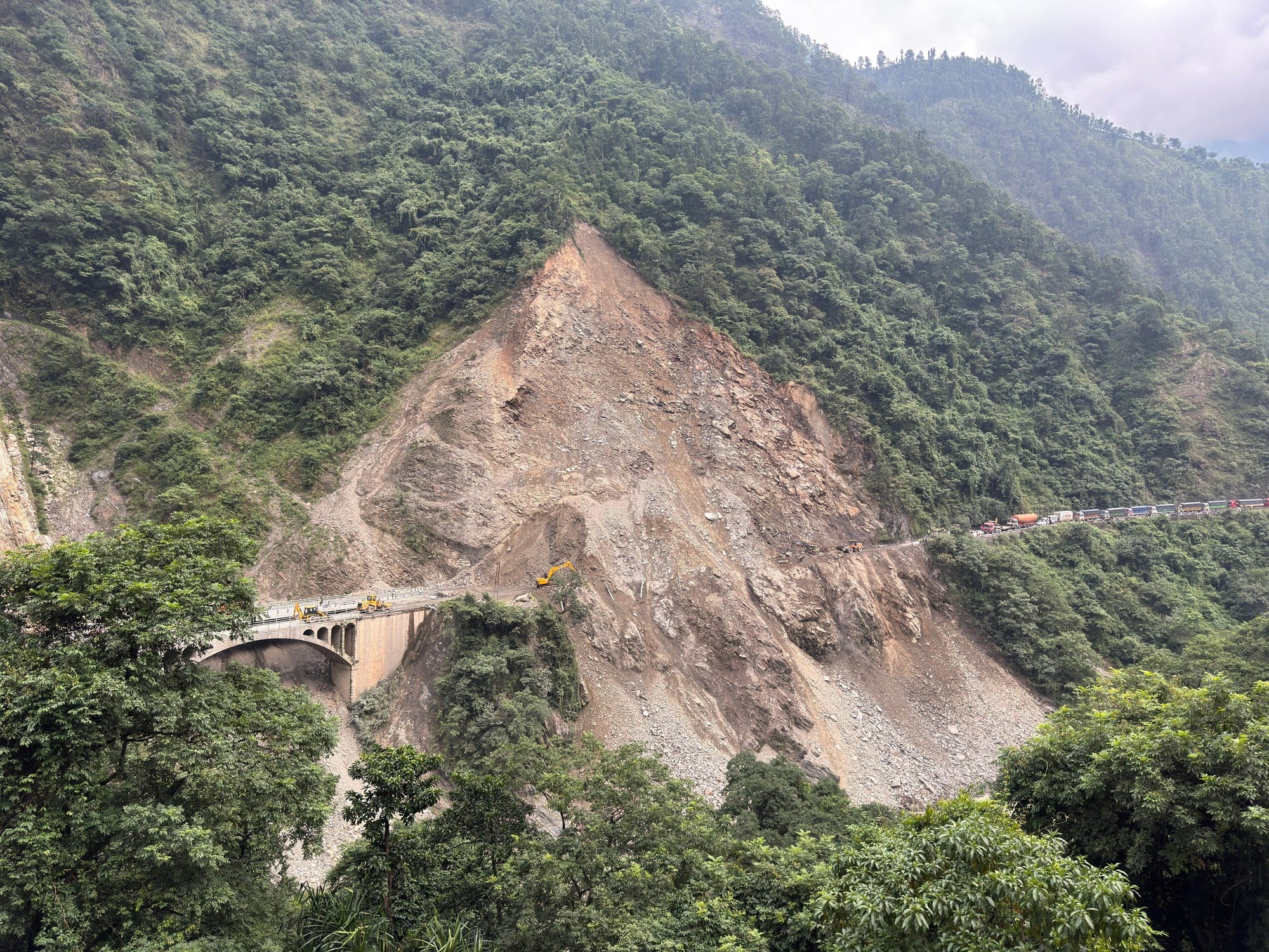 Rescue teams in Nepal are digging for people missing after floods and mudslides, Al Jazeera English reports, with the same saturated, unstable ground that buried them now slowing crews sent to reach them
