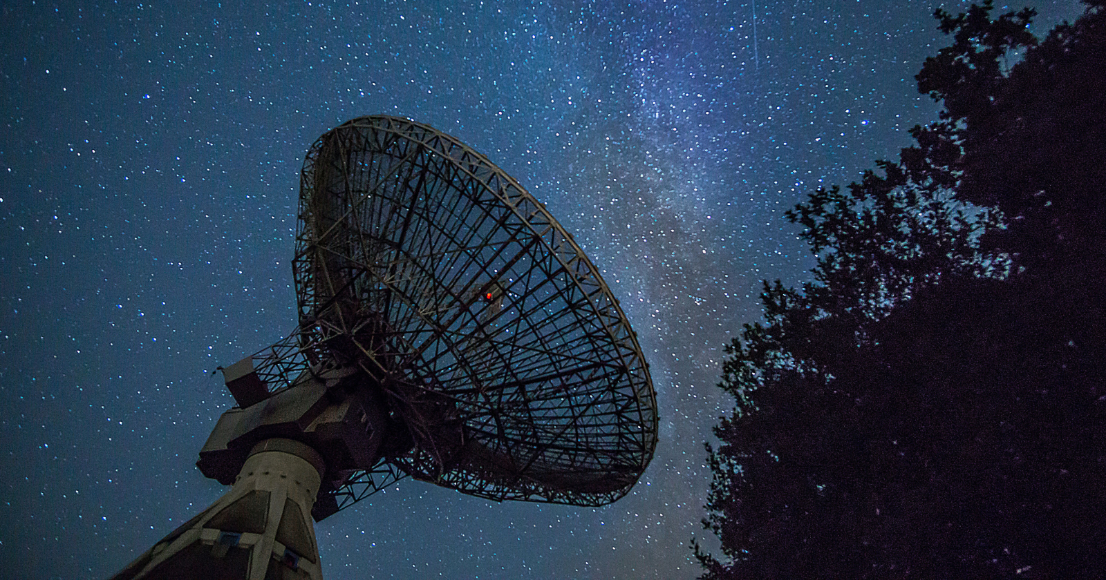 In 1977, an Ohio State radio telescope called Big Ear recorded a 72-second burst of radio noise from deep space so much stronger than the background static that an astronomer circled it on the printout and wrote ‘Wow!’ in red pen, and nobody has ever detected it again despite decades of listening.