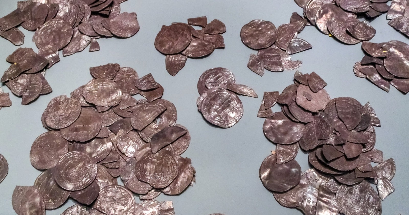 A dense scatter of Viking-Age silver coins from the Spillings Hoard, Gotland