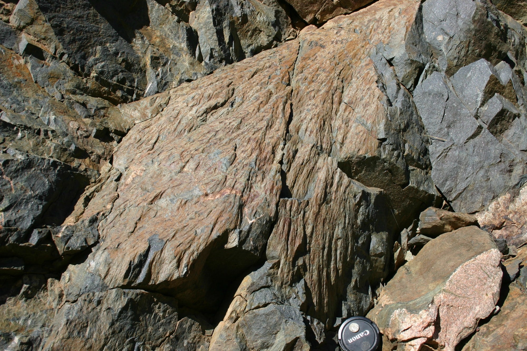 Rock face with ridged, cone-shaped shatter cone fractures in the Santa Fe impact structure, New Mexico